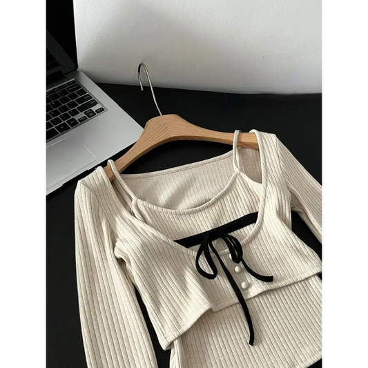 Beige cropped gyaru ribbed knit sweater top with faux-layered vest look and bow-tied bust