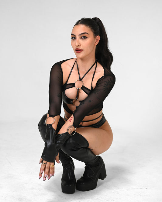 Black mesh and vegan-leather rave arm sleeves with silver O-ring shoulder connectors